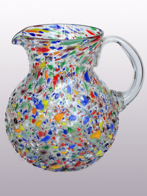 New Items / Large 118oz Confetti Rocks Pitcher / Confetti rocks appear to rest inside this modern blown glass pitcher that will make your table setting shine. Each pitcher is adorned with hundreds of tiny multicolor glass particles, giving it a one-of-a-kind look and feel.